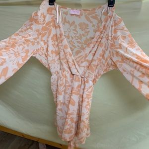 light orange romper with removable string to tighten
